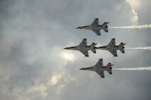 The Thunderbirds fly by in their diamond opener formation during the 2015 Dakota Thunder airshow and open house at Ellsworth Air Force Base S.D., Aug. 15, 2015. Ellsworth held the airshow to show its appreciation to the public for its support of the U.S. military over the years. (U.S. Air Force photo by Airman Sadie Colbert/Released)
