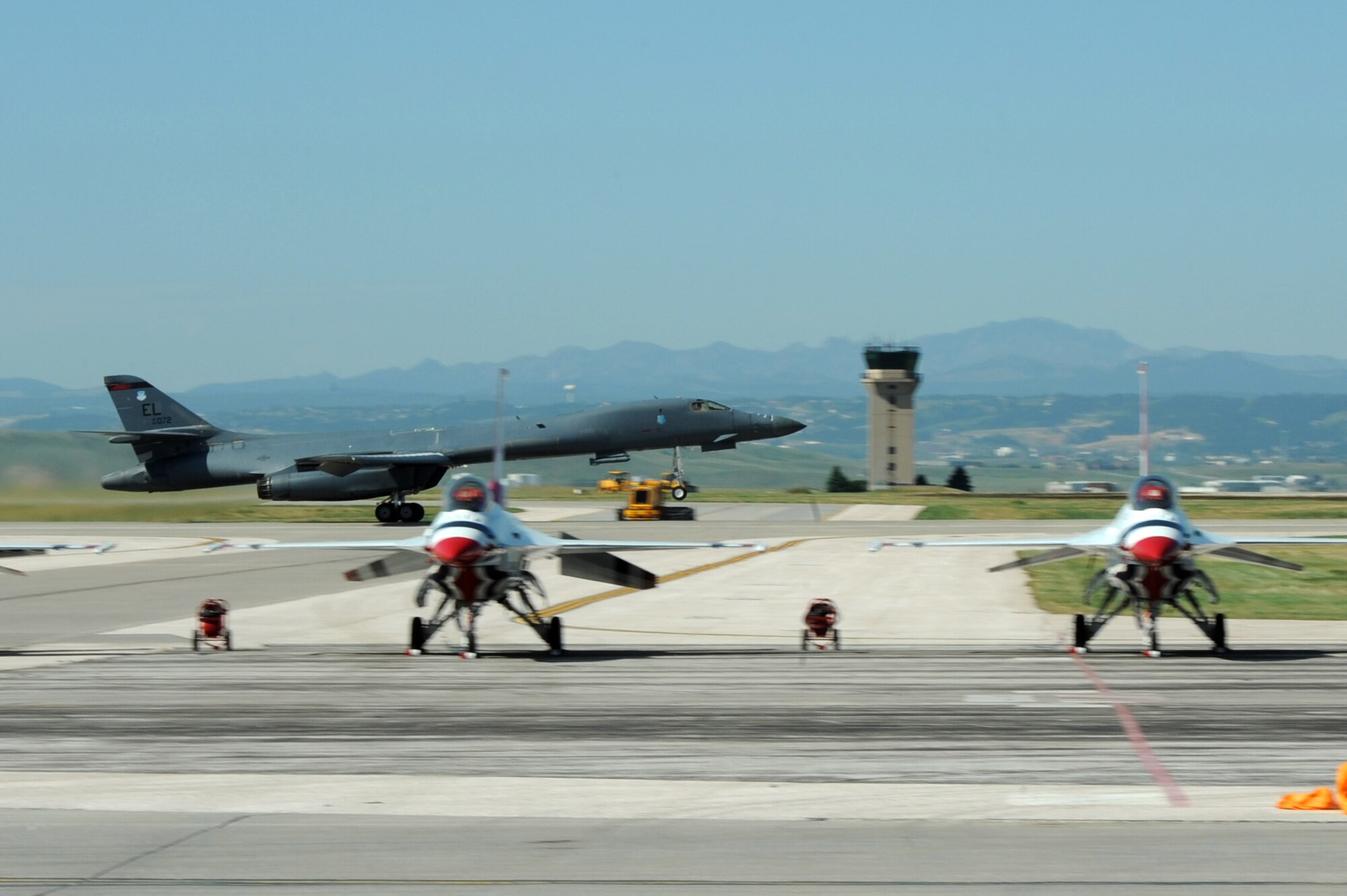 A B-1 bomber takes off during the 2015 Dakota Thunder airshow and open house at Ellsworth Air Force Base, S.D., Aug. 15, 2015. Two B-1s performed a take-off, as well as a close air support demonstration and high-speed pass, during the two-day show as part of the aerial entertainment for more than 51,000 attendees. (U.S. Air Force photo by Senior Airman Hailey R. Staker/Released)