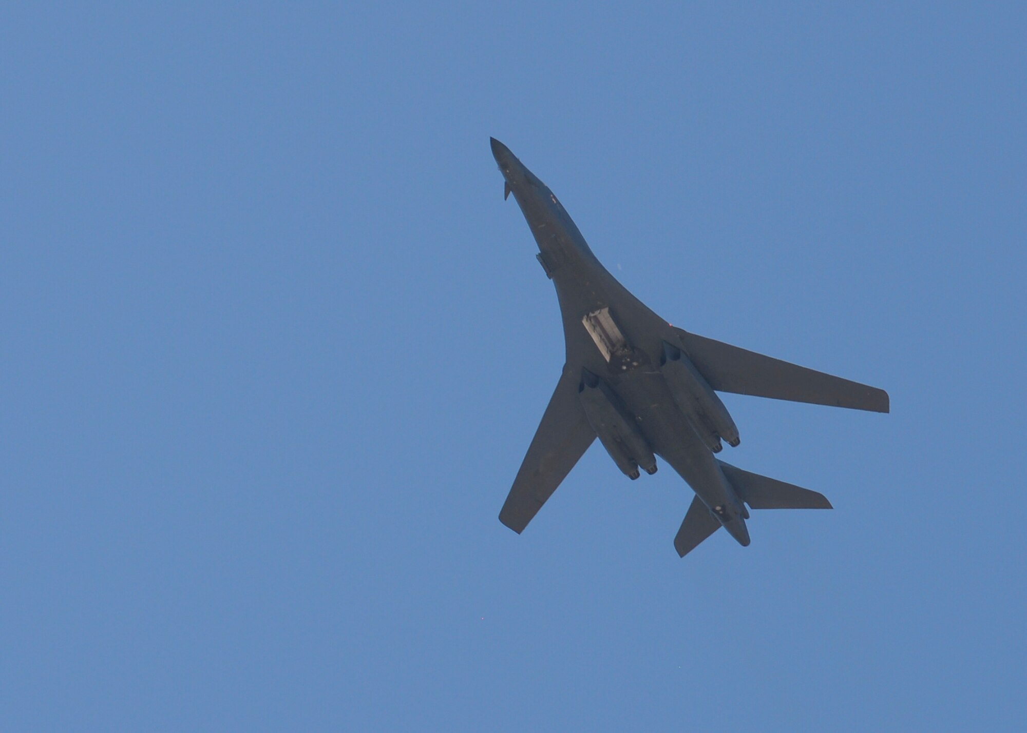 A B-1 bomber opens its bomb bay doors to simulate releasing weapons during a B-1 kinetic demonstration as part of the 2015 Dakota Thunder airshow and open house at Ellsworth Air Force Base, S.D., Aug. 15, 2015. The demonstration provided everyone an opportunity to see how effective a close air support mission can be in defeating our nation’s enemies. (U.S. Air Force photo by Senior Airman Anania Tekurio/Released)
