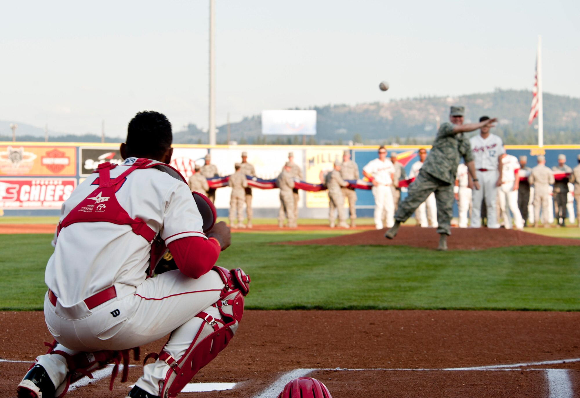 Col. Brian McDaniel, 92nd Air Refueling Wing commander, throws the first pitch Aug. 15, 2015, at Avista Stadium in Spokane, Wash. McDaniel was selected to throw the ceremonial first pitch for the Spokane Indian’s game during military appreciation night. (U.S. Air Force photo/Airman Sean Campbell) 