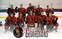Joint Base Andrews Guardians stand in the middle of the rink after a 7 - 6 victory at Capital Clubhouse in Waldorf, Md., Aug. 5, 2015. JBA Guardians were founded December 2013. During 2015, the Guardians won the North Carolina Classic and went undefeated becoming the Washington Division Champions.  (U.S Air Force graphic/Airman 1st Class Philip Bryant)