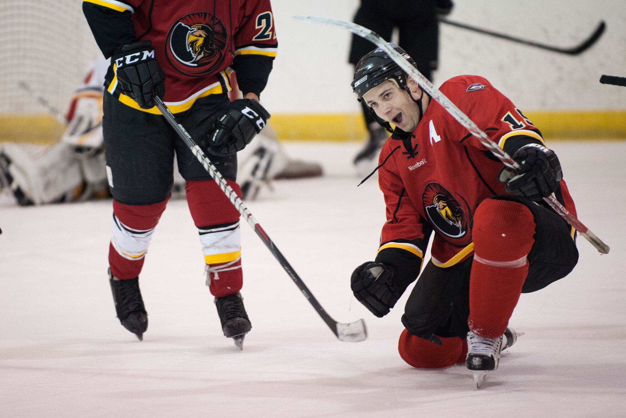1st Lt. Bill Harris, Joint Base Andrews Guardians forward, celebrates after scoring the winning goal with three seconds left in the game verses the Kraken, a Maryland based hockey team, at Capital Clubhouse in Waldorf, Md., Aug. 5, 2015. Harris leads the team in goals with 14 and had two goals during the game. (U.S. Air Force photo/Airman 1st Class Philip Bryant)