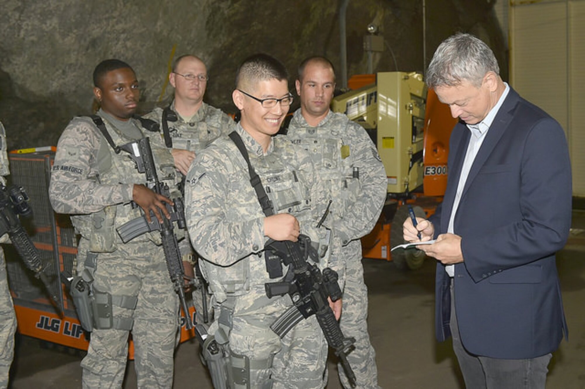 CHEYENNE MOUNTAIN AIR FORCE STATION, Colo. - Gary Sinise, actor and founder of the Gary Sinise Foundation, signs autographs for members of the 721st Security Forces Squadron during his visit to Cheyenne Mountain Air Force Station on Aug 9, 2015.  An advocate of America’s servicemen and women, Sinise wanted to personally thank the troops assigned to CMAFS for the sacrifices that they, and their families, make every day to serve our great nation. (courtesy photo)