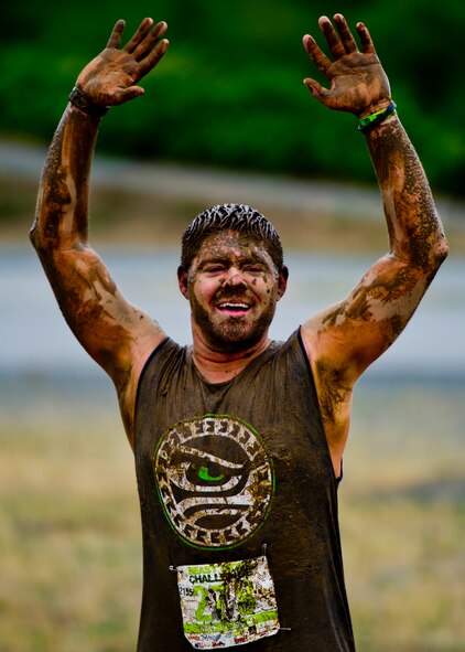 Participants in the Beast Mode Challenge sponsored by the Air Force Reserve, race through an obstacle course in Snoqualmie, Wash., Aug. 15, 2015. The challenge was composed of a 3.5-mile mud-ridden obstacle course - with 12 football-themed trials of hills, blockades, water, and sludge, created to trigger one's inner Beast Mode. A portion of the race proceeds and 100% of donations went directly to the  Fam 1st Family Foundation co-founded by Marshawn ‘Beast Mode’ Lynch of the Seattle Seahawks. The Fam 1st Family Foundation is dedicated to uplifting and empowering youth in the Bay Area and throughout the United States. The foundation’s mission is one of empowerment and education,aiming to build self-esteem and academic learning skills in underprivileged youth. (U.S. Air Force Reserve photo by Senior Airman Daniel Liddicoet/Released)
