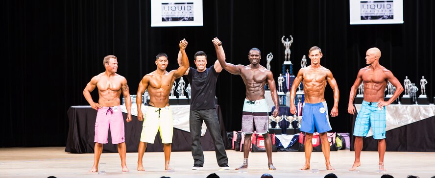 Senior Airman Miguel Amador, 5th Medical Group medical information service technician, receives second place in the Gopher State bodybuilding competition in Minneapolis, MN, April 18, 2015. Amador has begun training for his next bodybuilding competition, which is in October. (Courtesy photo)