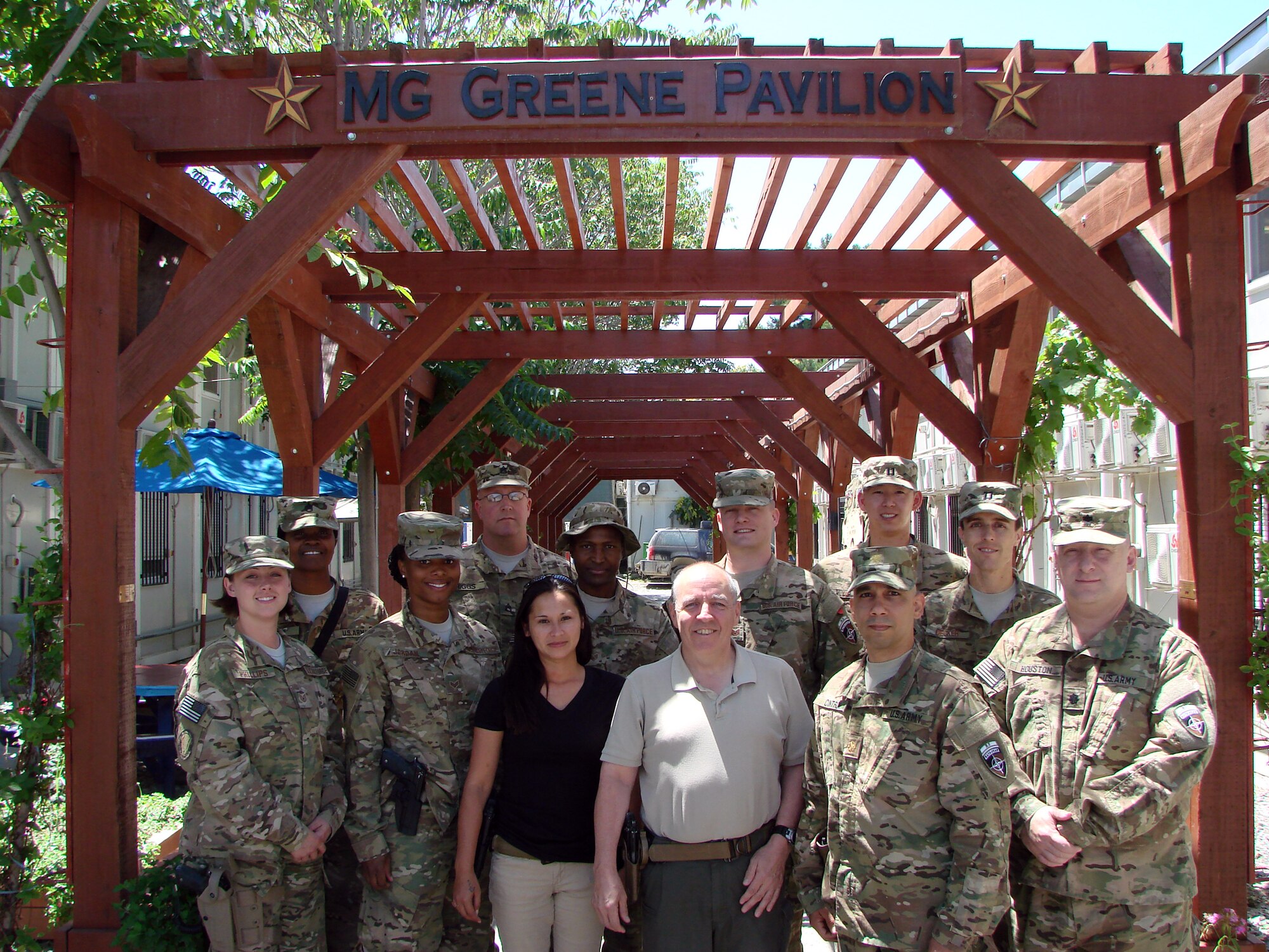 KABUL, Afghanistan – Rebecca Bailey, 445th Airlift Wing budget analyst, shares a moment with her deployed co-workers at the Maj. Gen. Harold Greene Memorial Pavilion in Kabul, Afghanistan. Bailey is currently deployed as a systems managerial accountant supporting the Camp Resolute Support mission. (Courtesy photo)