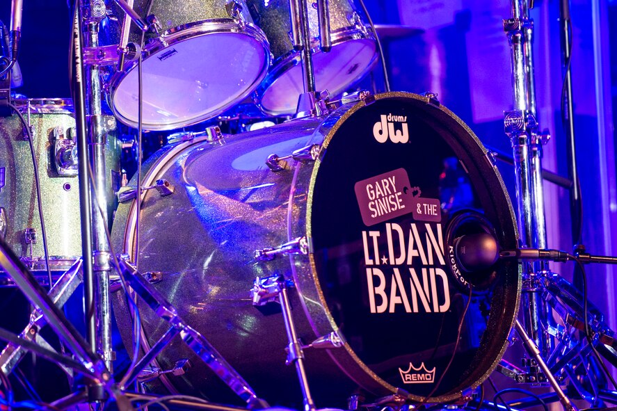 The Lt. Dan Band’s drum set sits on stage during the band’s performance in Dock 1 at Minot Air Force Base, N.D., Aug. 15, 2015. The Lt. Dan Band, a program of the Gary Sinise Foundation, is a 12-member group that has performed hundreds of concerts for military members worldwide since 2003. (U.S. Air Force photo/ Airman 1st Class Justin T. Armstrong)
