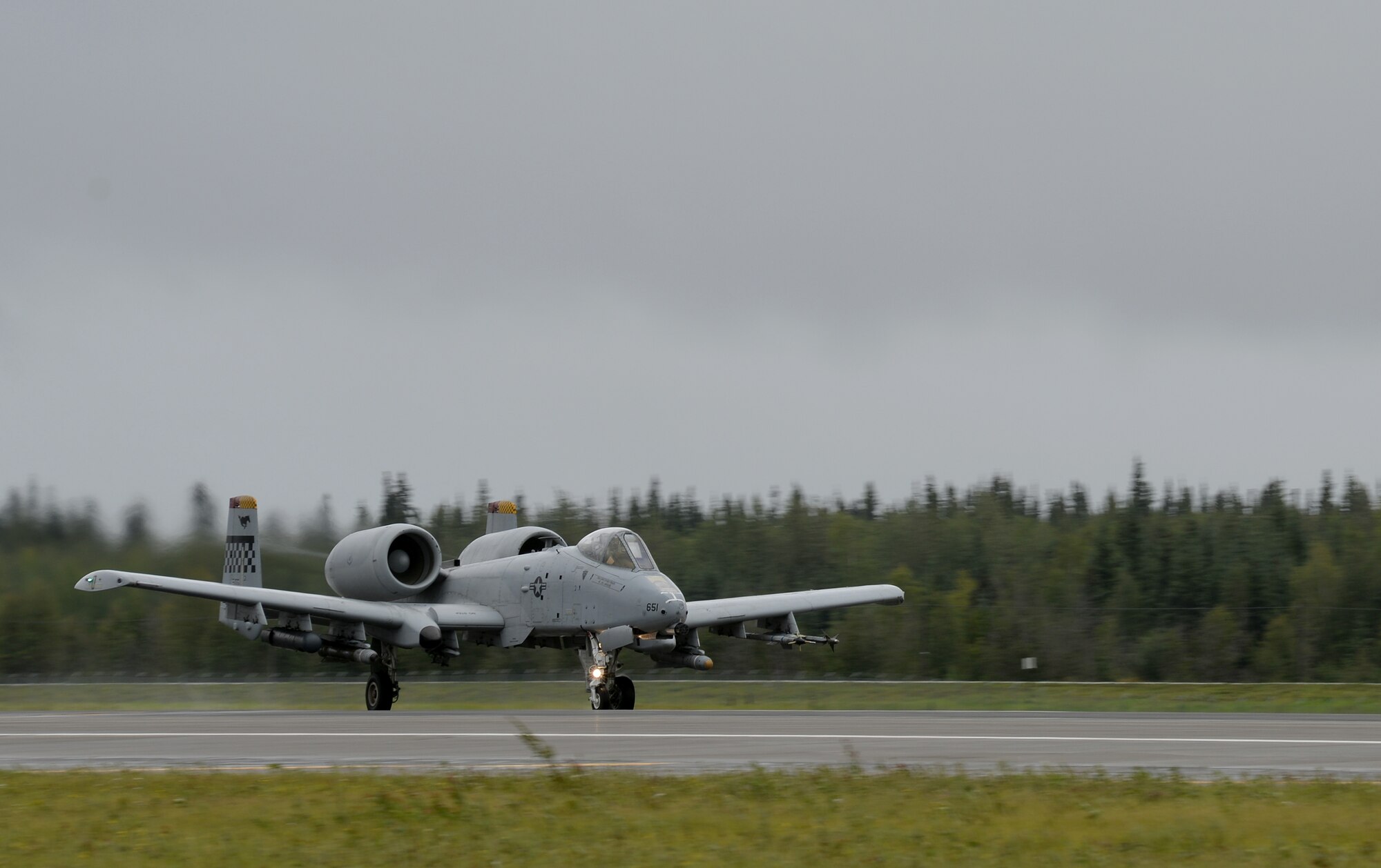 U.S. Air Force A-10 Thunderbolt II with the 25th Fighter Squadron from Osan Air Base, Republic of Korea, takes off from Eielson Air Force Base, Alaska, Aug. 10, 2015, to participate in the first simulated combat sortie of RED FLAG-Alaska (RF-A) 15-3. The Osan A-10s, as well as several F-16 Fighting Falcons from Osan's 36th Fighter Squadron, are deployed to Eielson for RF-A, a series of Pacific Air Forces commander-directed field training exercises for U.S. and partner nation forces, providing combined offensive counter-air, interdiction, close air support, and large force employment training in a simulated combat environment. (U.S. Air Force photo by Master Sgt. Karen J. Tomasik/Released)