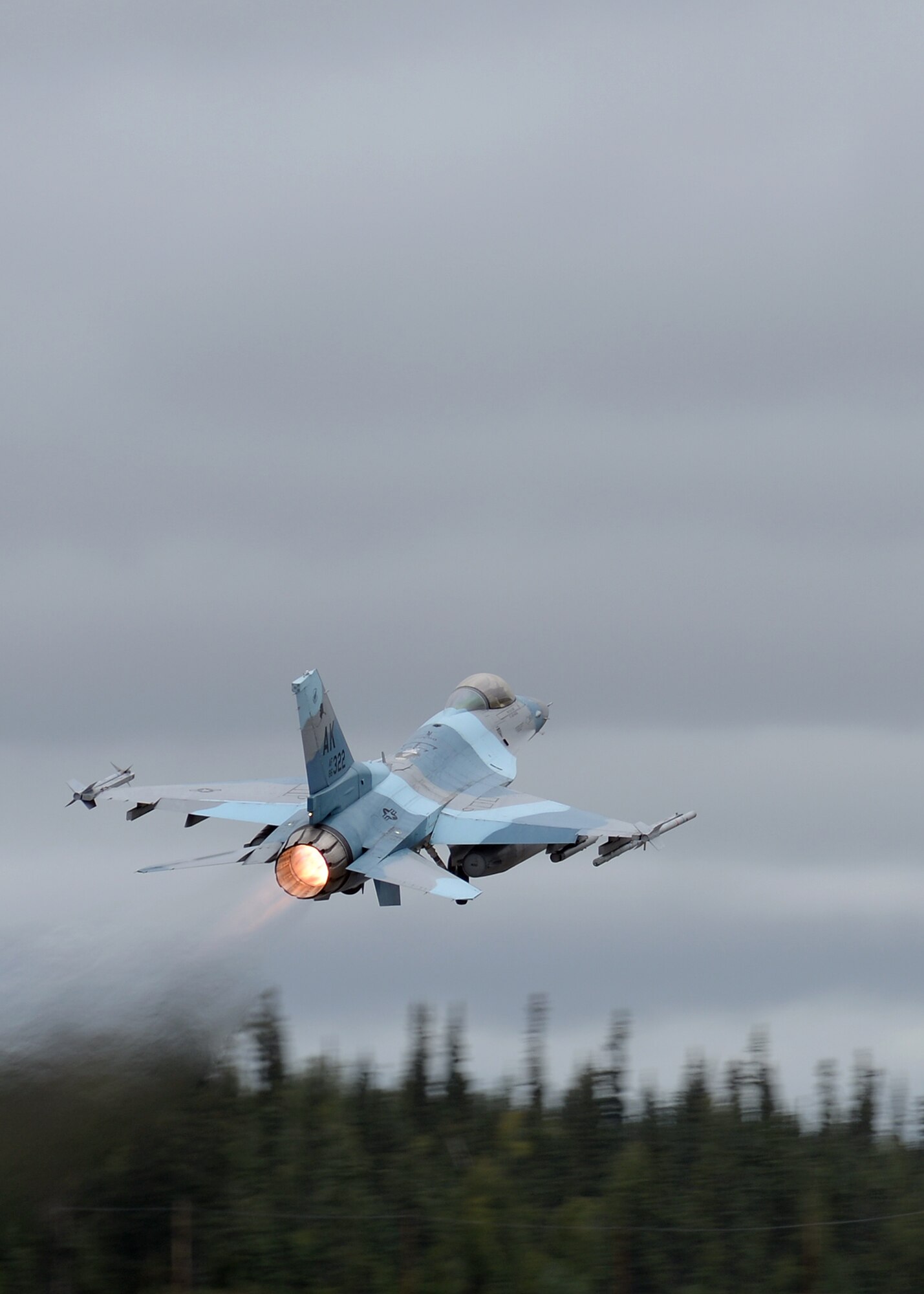 A U.S. Air Force F-16 Fighting Falcon assigned to the 18th Aggressor Squadron takes off from Eielson Air Force Base, Alaska, Aug. 10, 2015, during RED FLAG-Alaska (RF-A) 15-3. RF-A is a series of Pacific Air Forces commander-directed field training exercises for U.S. and partner nation forces, providing combined offensive counter-air, interdiction, close air support and large force employment training in a simulated combat environment. (U.S. Air Force photo by Master Sgt. Karen J. Tomasik/Released)
