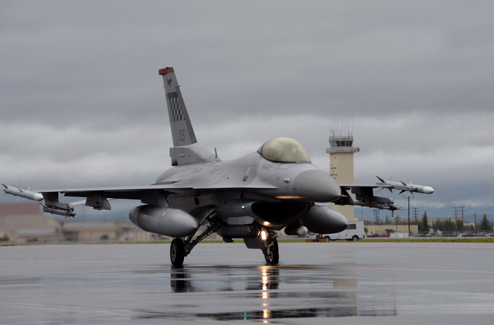 A U.S. Air Force F-16 Fighting Falcon assigned to the 36th Fighter Squadron from Osan Air Base, Republic of Korea, taxis into place at Eielson Air Force Base, Alaska, Aug. 10, 2015, for the first simulated combat sortie of RED FLAG-Alaska (RF-A) 15-3. The Osan F-16s, as well as several A-10 Thunderbolt II aircraft from Osan's 25th Fighter Squadron, are deployed to Eielson for RF-A, a series of Pacific Air Forces commander-directed field training exercises for U.S. and partner nation forces, providing combined offensive counter-air, interdiction, close air support and large force employment training in a simulated combat environment. (U.S. Air Force photo by Master Sgt. Karen J. Tomasik/Released)