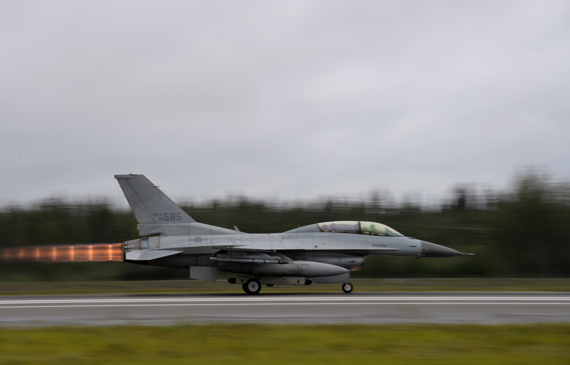 A Republic of Korea Air Force (ROKAF) F-16D Fighting Falcon takes off from Eielson Air Force Base, Alaska, Aug. 10, 2015, during RED FLAG-Alaska (RF-A) 15-3. ROKAF and Japan Air Self-Defense Force units are deployed to Eielson along with assorted tanker, transport, fighter and electronic warfare aircraft and support personnel from various service branches for RF-A, a series of Pacific Air Forces commander-directed field training exercises for U.S. and partner nation forces, providing combined offensive counter-air, interdiction, close air support, and large force employment training in a simulated combat environment. (U.S. Air Force photo by Master Sgt. Karen J. Tomasik/Released)