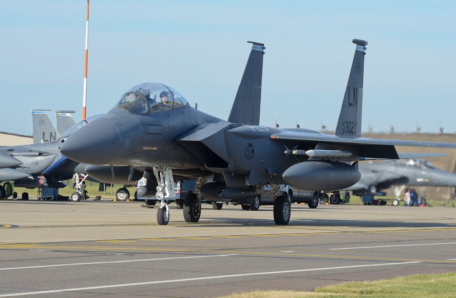 An F-15E Strike Eagle, assigned to the 48th Fighter Wing, taxis down the flightline at Royal Air Force Lakenheath, England, during a training sortie, Aug. 17, 2015. The 48th FW is responsible for providing air combat superiority for United States Air Forces in Europe and Air Forces Africa area of responsibility. (U.S. Air Force photo by Senior Airman Trevor T. McBride/Released)