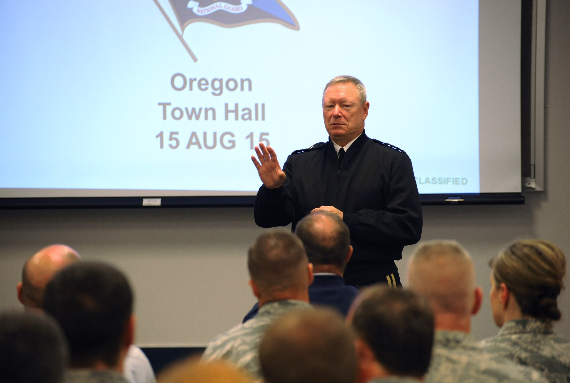 Army Gen. Frank J. Grass, Director of the National Guard Bureau, addresses Airmen at the Portland Air National Guard Base, Ore., during a town hall event, Aug. 15, 2015. Grass, as well as his senior enlisted advisor Air Force Chief Master Sgt. Mitchell O. Brush, was making their second trip Oregon in the past two years. (U.S. Air National Guard photo by Tech. Sgt. John Hughel, 142nd Fighter Wing Public Affairs/Released)