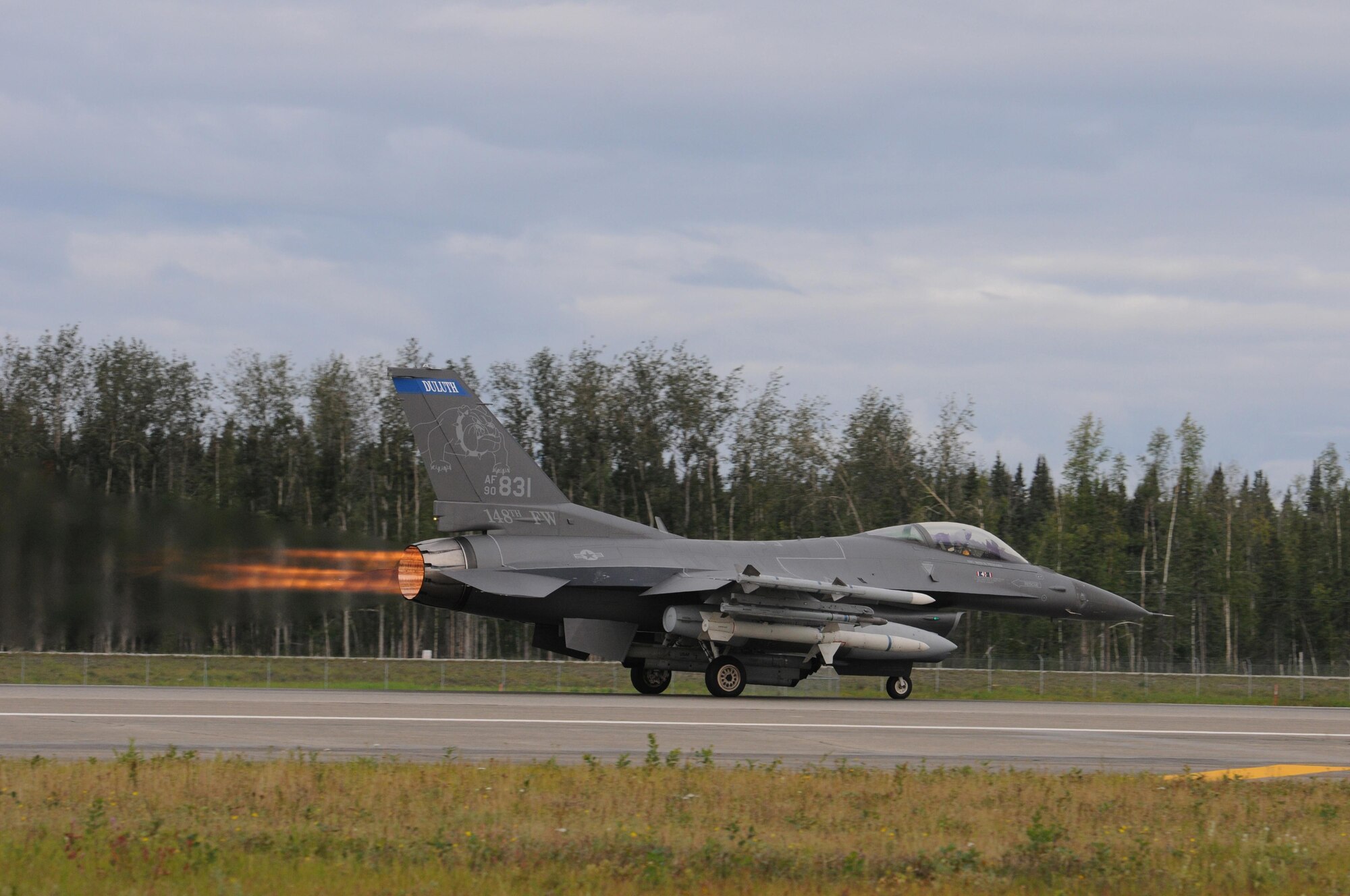 A U.S. Air Force F-16 Fighting Falcon from the 148th Fighter Wing, Duluth, Minn., takes-off at Eielson Air Force Base, Alaska, Aug. 11, 2015, during RED FLAG-Alaska 15-3.  RF-A is a Pacific Air Forces commander-directed field training exercise for U.S. and partner nation forces, providing combined offensive counter-air, interdiction, close air support and large force employment training in a simulated combat environment.  (U.S. Air Force photo by Master Sgt. Ralph Kapustka/Released)