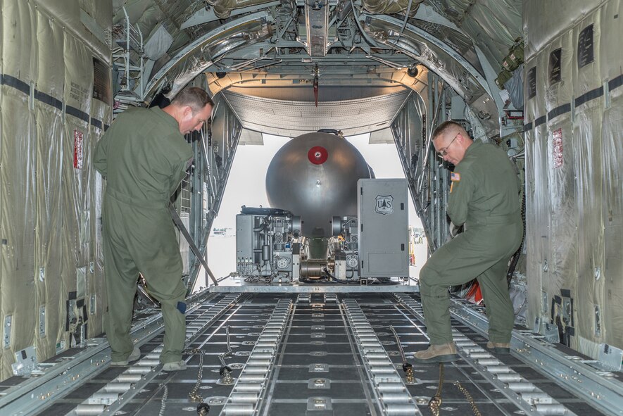 Airmen assigned to the 153rd Airlift Wing load and configure a Modular Airborne Fire Fighting System (MAFFS II) on a C-130H Hercules aircraft. Wyoming Air National Guard MAFFS II certified crews will join the 302nd Airlift Wing, Colorado Springs, Colorado and the 145th Airlift Wing, North Carolina Air National Guard in California to assist in the containment of fires on the West Coast. (U.S. Air National Guard photos and video by Master Sgt. Charles Delano)