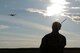 U.S. Air Force Capt. Michael Spanogle, 3rd Air Support Operations Squadron air mobility liaison officer, communicates with aircrew flying overhead a landing zone during RED FLAG-Alaska at Joint Base Elmendorf-Richardson, Alaska, Aug. 14, 2015.
The training allowed C-130 aircrew to practice austere landings and take offs, combat offloads and supply drops, but also allowed friendly competition between participating Air Forces: U.S. Air Force, Japan Air Self-Defense Force, Royal Air Force, Royal Australian Air Force, Royal New Zealand Air Force and Royal Thai Air Force. Seasoned C-130 aircrew from each country judged the training exercises from the ground, allotting points based off predetermined timing and accuracy requirements. (U.S. Air Force photo by Staff Sgt. Cody H. Ramirez/Released)