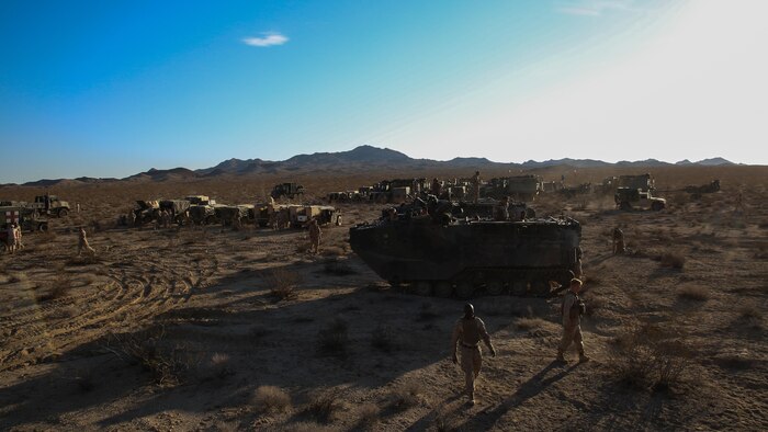 Marines with 1st Battalion, 3rd Marine Regiment prepare to start the movement to contact training event during Large Scale Exercise 15 at Marine Corps Air Ground Combat Center, Twentynine Palms, Calif., Aug. 14–15, 2015. LSE-15 is a combined U.S. Marine Corps, Canadian and British exercise conducted at the brigade level, designed to enable live, virtual and constructive training for participating forces. 