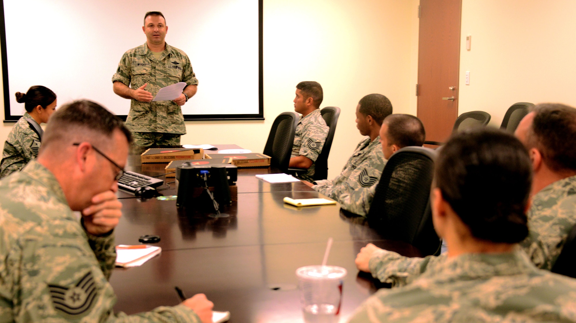 Senior Master Sgt. Terry Wright, 353rd Special Operations Support Squadron, speaks about promotion boards during a Special Operations Group Top 3 Lunch and Learn August 13, 2015 at Kadena Air Base, Japan.  SOG Top 3 Lunch and Learns are an opportunity for SOG Airmen to come together to share information and provide mentorship.  (U.S. Air Force photo by Tech. Sgt. Kristine Dreyer)