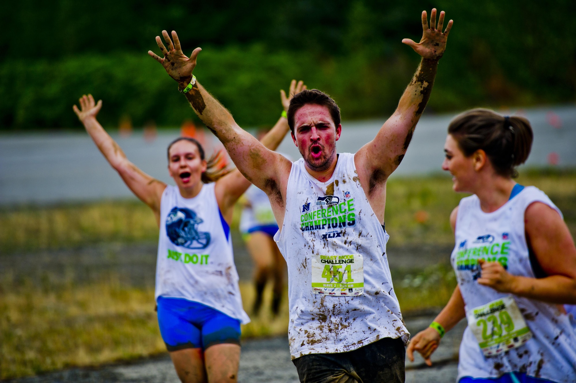 Participants in the Beast Mode Challenge sponsored by the Air Force Reserve, races through an obstacle course in Snoqualmie, Wash., Aug. 15, 2015. The challenge was composed of a 3.5-mile mud-ridden obstacle course - with 12 football-themed trials of hills, blockades, water, and sludge, created to trigger one's inner Beast Mode. A portion of the race proceeds and 100% of donations went directly to the Fam 1st Family Foundation co-founded by Marshawn ‘Beast Mode’ Lynch of the Seattle Seahawks. The Fam 1st Family Foundation is dedicated to uplifting and empowering youth in the Bay Area and throughout the United States. The foundation’s mission is one of empowerment and education,aiming to build self-esteem and academic learning skills in underprivileged youth. (U.S. Air Force photo/Senior Airman Daniel Liddicoet)