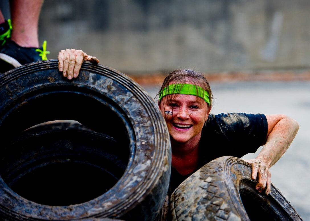 A participant in the Beast Mode Challenge sponsored by the Air Force Reserve, races through an obstacle course in Snoqualmie, Wash., Aug. 15, 2015. The challenge was composed of a 3.5-mile mud-ridden obstacle course - with 12 football-themed trials of hills, blockades, water, and sludge, created to trigger one's inner Beast Mode. A portion of the race proceeds and 100% of donations went directly to the Fam 1st Family Foundation co-founded by Marshawn ‘Beast Mode’ Lynch of the Seattle Seahawks. The Fam 1st Family Foundation is dedicated to uplifting and empowering youth in the Bay Area and throughout the United States. The foundation’s mission is one of empowerment and education,aiming to build self-esteem and academic learning skills in underprivileged youth. (U.S. Air Force photo/Senior Airman Daniel Liddicoet)
