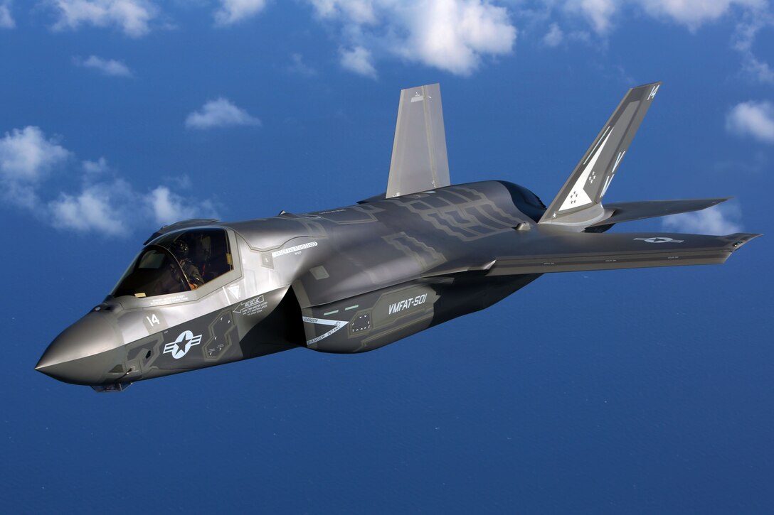 An F-35B joint strike fighter jet conducts aerial maneuvers during aerial refueling training over the Atlantic Ocean, Aug. 13, 2015. The mission of Marine Fighter Attack Training Squadron 501 is to conduct effective training and operations in the F-35B in coordination with joint and coalition partners in order to successfully attain the annual pilot training requirement. VMFAT-501 is based at Marine Corps Air Station Beaufort, South Carolina. (U.S. Marine Corps photo by Cpl. N.W. Huertas/Released)
