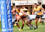Spc. Faleniko Spino of Joint Base Lewis-McChord, Wash., drives for a try during All-Army's 43-12 victory over All-Air Force in the gold-medal game of the 2015 Armed Forces Rugby 7s Championship Tournament on Saturday at Infinity Park in Glendale, Colo. U.S. Army photo by Tim Hipps, IMCOM Public Affairs