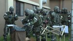 OSAN AIR BASE, Republic of Korea (Aug. 18, 2015) - Airmen assigned to the 51st Fighter Wing prepare to decontaminate themselves following a simulated chemical attack. The Airmen were practicing the procedures to safely enter a collective protection system dormitory. The collective protection system (CPS) is a standby system within designated facilities that is activated when there is a chemical or biological threat. The CPS function is also used for facility occupants and shelter management team training during exercises. 