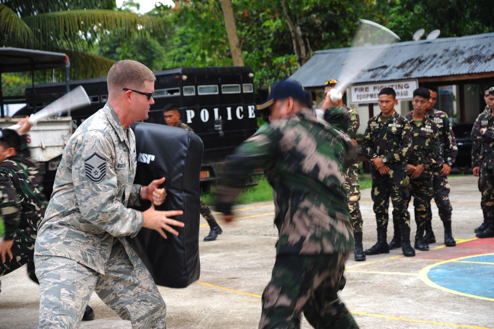 U.S. Air Force Master Sgt. Jeremy Burkeen, from 736th Security Forces Squadron at Andersen Air Force Base, Guam, facilitates non-lethal crowd control training with members of the Philippine national police and Armed Forces of the Philippines during Pacific Angel in Tagbiliran City, Philippines, Aug. 16, 2015. Efforts undertaken during Pacific Angel help multilateral militaries in the Pacific improve and build relationships across a wide spectrum of civic operations, which bolsters each nation’s capacity to respond and support future humanitarian assistance and disaster relief operations. (U.S. Air Force photo by Tech. Sgt. Aaron Oelrich/Released)