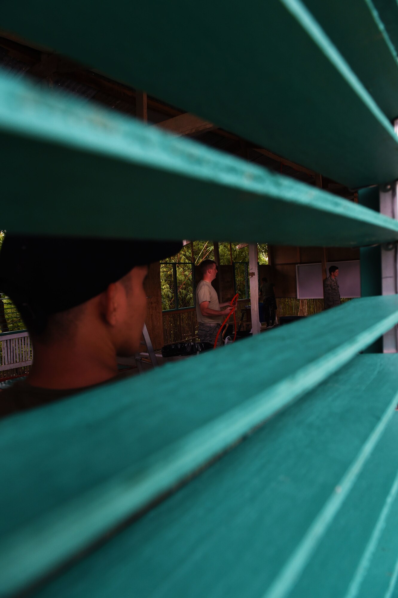 Members of the Armed Forces of the Philippines and U.S. military work together to install electrical wiring at San Isidro National High School in support of Pacific Angel in Tagbiliran City, Philippines, Aug. 16, 2015. Efforts undertaken during Pacific Angel help multilateral militaries in the Pacific improve and build relationships across a wide spectrum of civic operations, which bolsters each nation’s capacity to respond and support future humanitarian assistance and disaster relief operations. (U.S. Air Force photo by Tech. Sgt. Aaron Oelrich/Released)