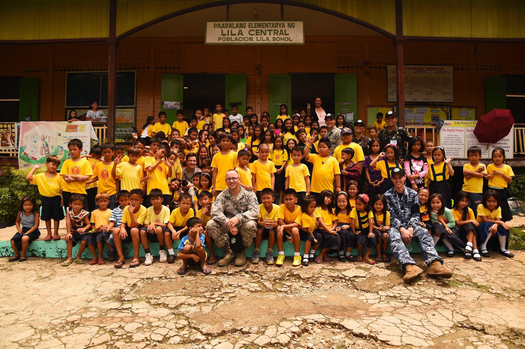 Medical professionals from the U.S. Air Force, Armed Forces of the Philippines and the Royal Australian Air Force traveled to Paaralang Elementary school to provide students information about oral heath, general hygiene and rabies prevention during Pacific Angel in Lila, Philippines, Aug. 17, 2015. Pacific Angel is a multilateral humanitarian assistance civil military operation, which improves military-to-military partnerships in the Pacific while also providing medical health outreach, civic engineering projects and subject matter exchanges among partner forces. (U.S. Air Force photo by Tech. Sgt. Aaron Oelrich/Released)