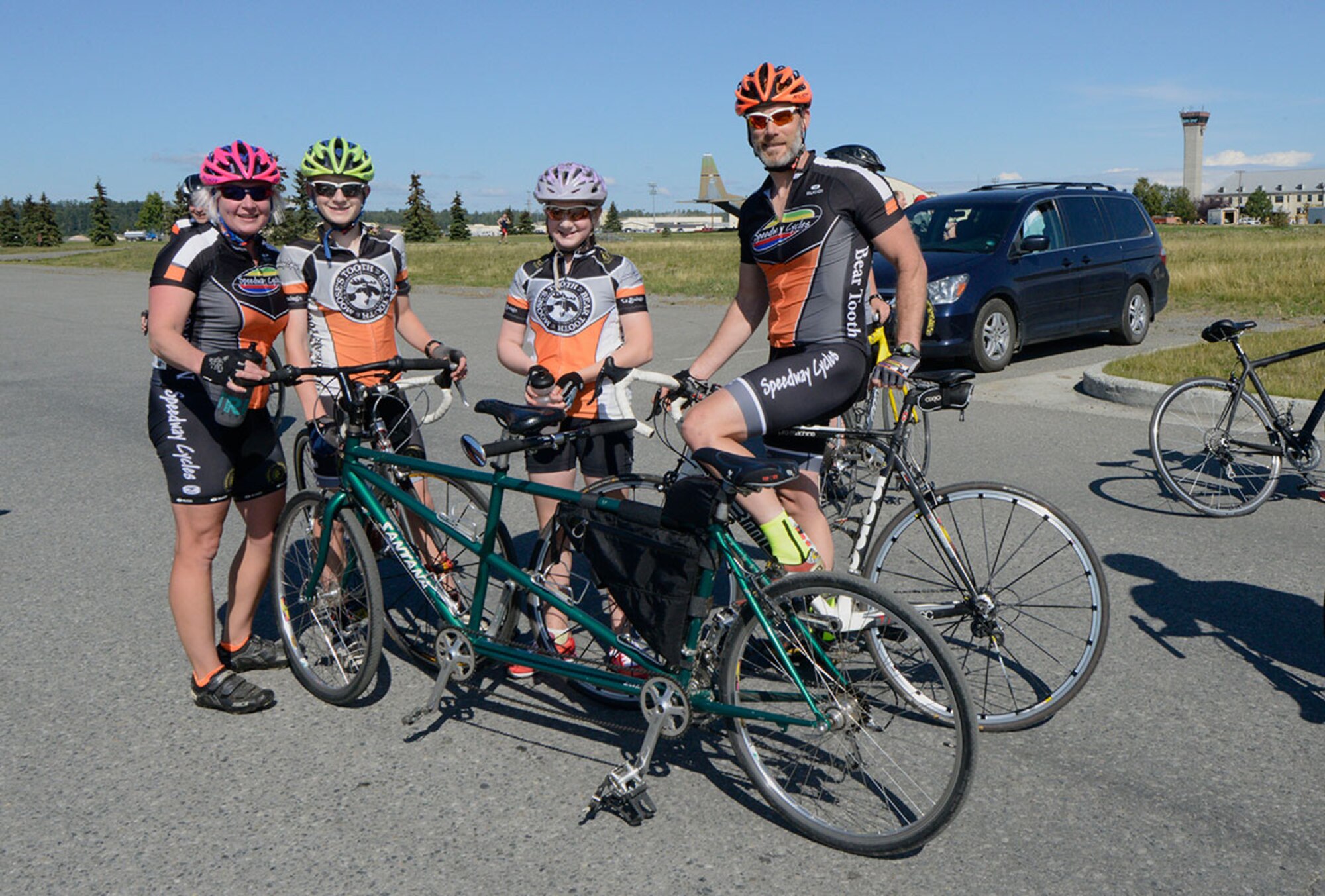 [From right to left] Lt. Col. Mike Beiergrohslein, U.S. Public Health Service, poses with his children, Zoee, 11, and Max, 13, and his wife Alycia, after a 17-mile bike race on Joint Base Elmendorf-Richardson, Alaska, August 14, 2015. Both mother and daughter completed the race together on a tandem bicycle. (U.S. Air Force photo/Airman Valerie A. Monroy)