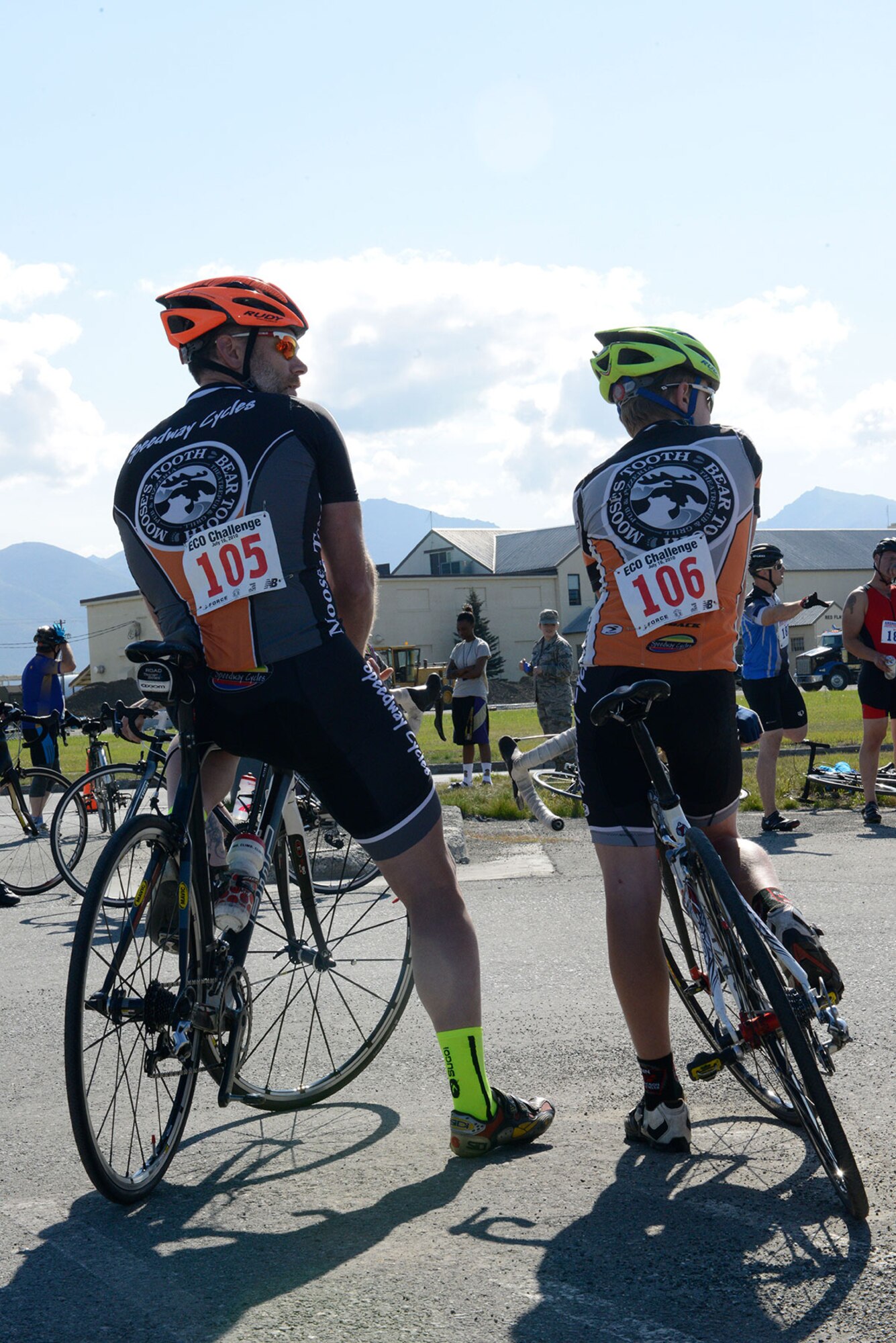 Lt. Col. Mike Beiergrohslein, U.S. Public Health Service, and his son Max, 13, await instructions before starting a 17-mile bike race on Joint Base Elmendorf-Richardson, Alaska, August 14, 2015. This is the summer’s first official bike race, with the youngest participant being 11 years old. (U.S. Air Force photo/Airman Valerie A. Monroy)