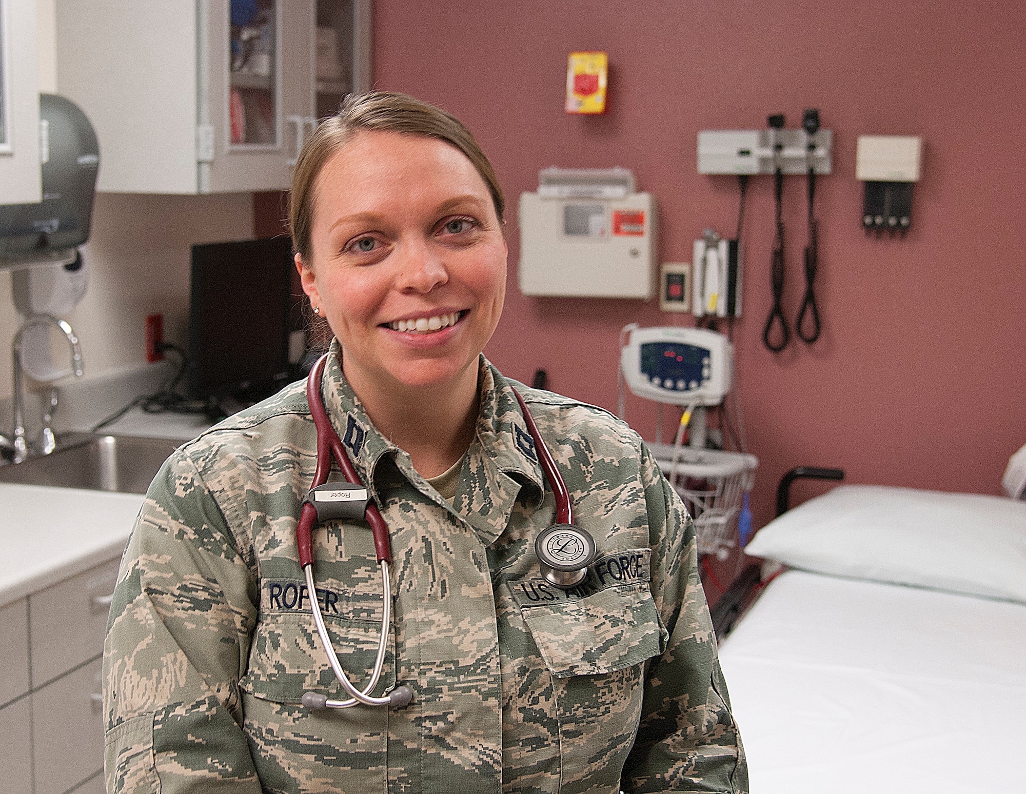 Capt. Jennifer Roper, 90th Medical Operations Squadron family physician, poses in the 90th Medical Group Medical Treatment Facility Aug. 18, 2015, on F.E. Warren Air Force Base, Wyo. Roper offered advice on how to prevent Rhabdomyolysis, the build-up of intracellular material in the blood from damaged muscles, which included staying hydrated and knowing one’s limits during exercise. (U.S. Air Force photo by Senior Airman Jason Wiese)