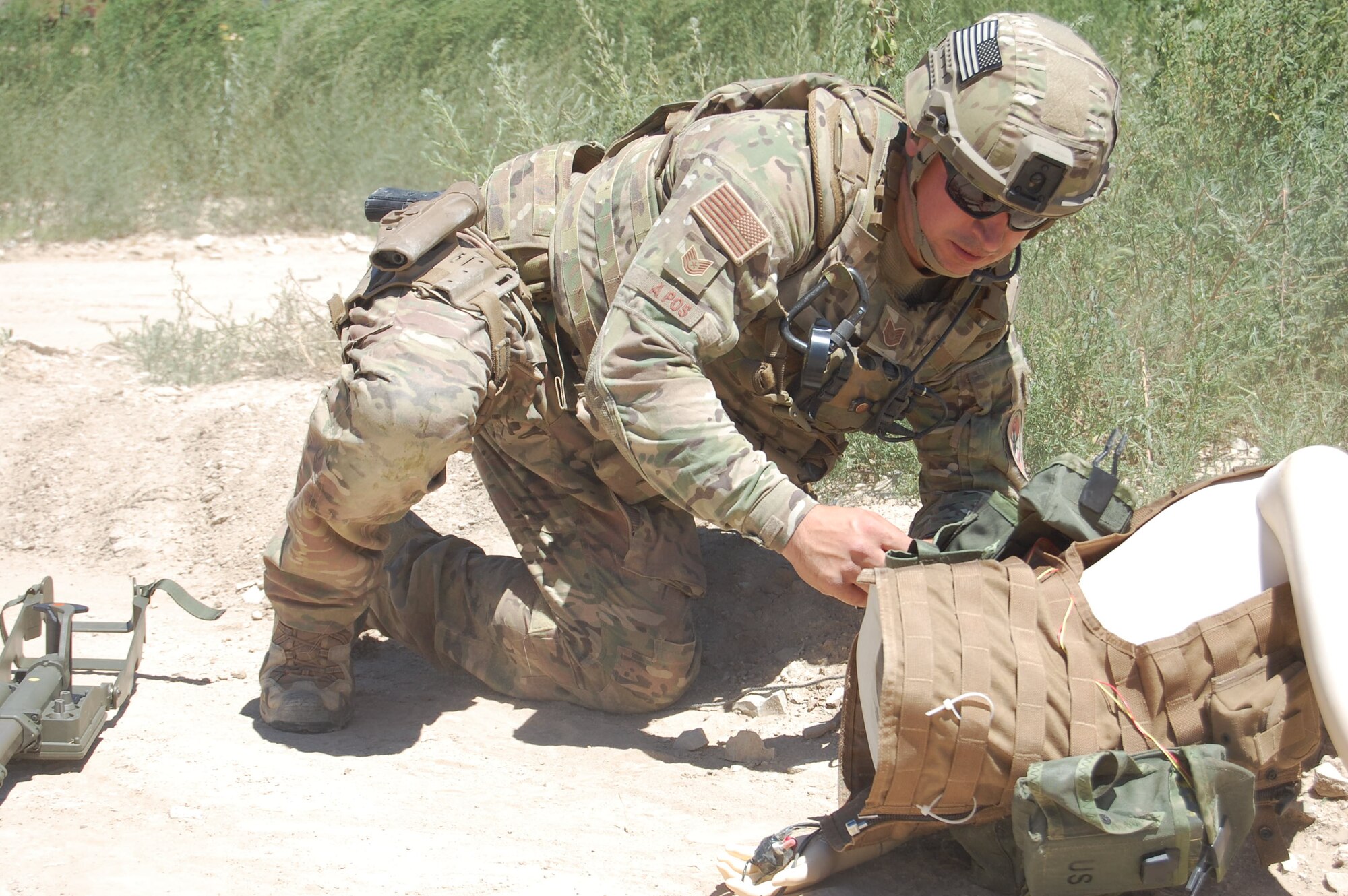 Members of the140th Explosive Ordnance Disposal Flight and the140th Security Forces Squadron, 140th Wing, Colorado Air National Guard, executed a multi-stage mission scenario, while simultaneously being evaluated by the Inspector General team to identify weaknesses and improve tactics August 6 at Airburst Range, Fort Carson, Colo. (US Air National Guard photo by Capt. Kinder Blacke)