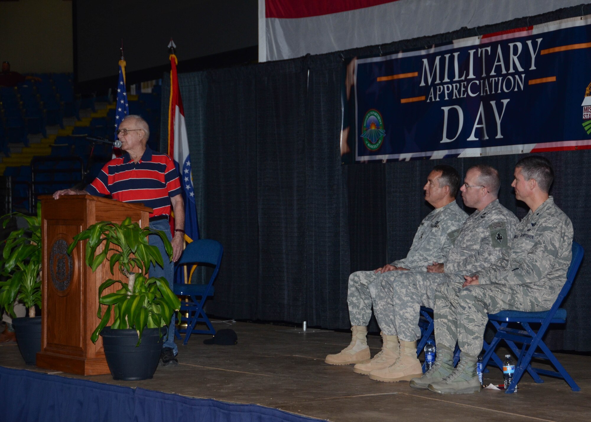 Maj. Gen. Stephen L. Danner, Brig. Gen. James Raymer and Brig. Gen. Paul W. Tibbets IV listen as guest speaker and World War II veteran Dale Mitchell recounts his military career at the Missouri State Fair Military Appreciation Day August 16, 2015. (U.S. Air National Guard photo by Staff Sgt. Brittany Cannon)

