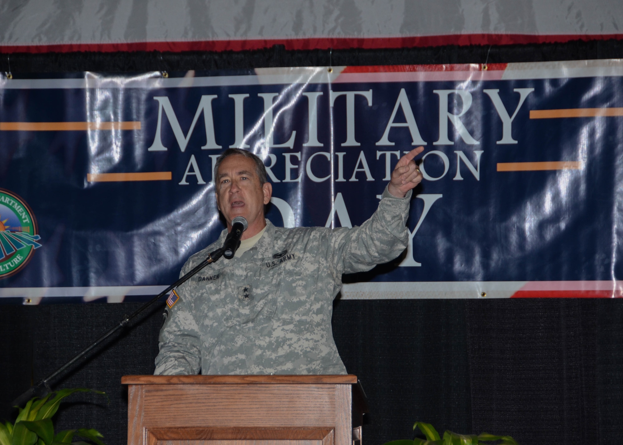 Maj. Gen. Stephen L. Danner pumps up the crowd in attendance at the Missouri State Fair Military Appreciation Day, August 16, 2015. (U.S. Air National Guard photo by Staff Sgt. Brittany Cannon)

