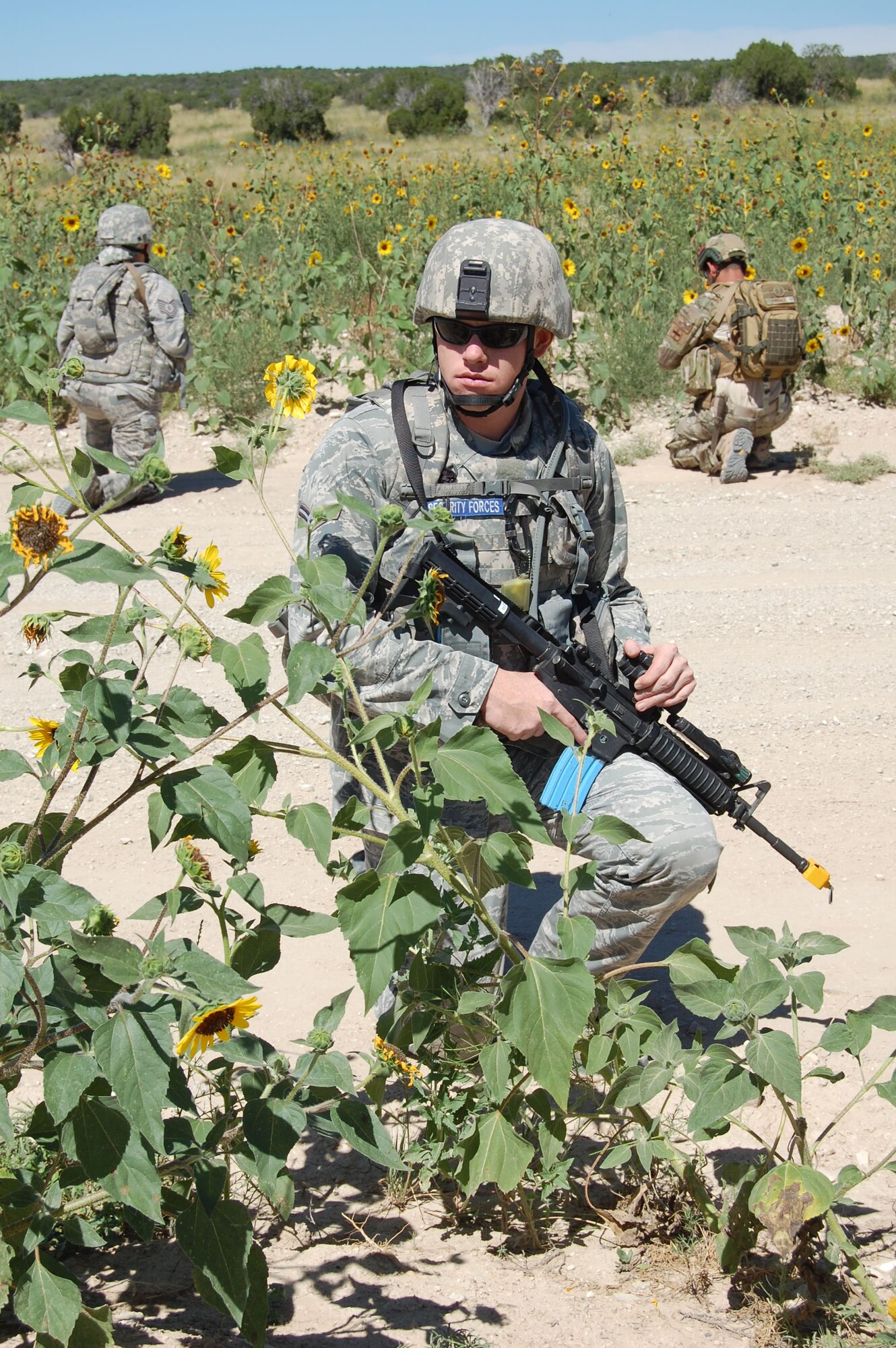 Members of the140th Explosive Ordnance Disposal Flight and the140th Security Forces Squadron, 140th Wing, Colorado Air National Guard, executed a multi-stage mission scenario, while simultaneously being evaluated by the Inspector General team to identify weaknesses and improve tactics August 6 at Airburst Range, Fort Carson, Colo. (US Air National Guard photo by Capt. Kinder Blacke)