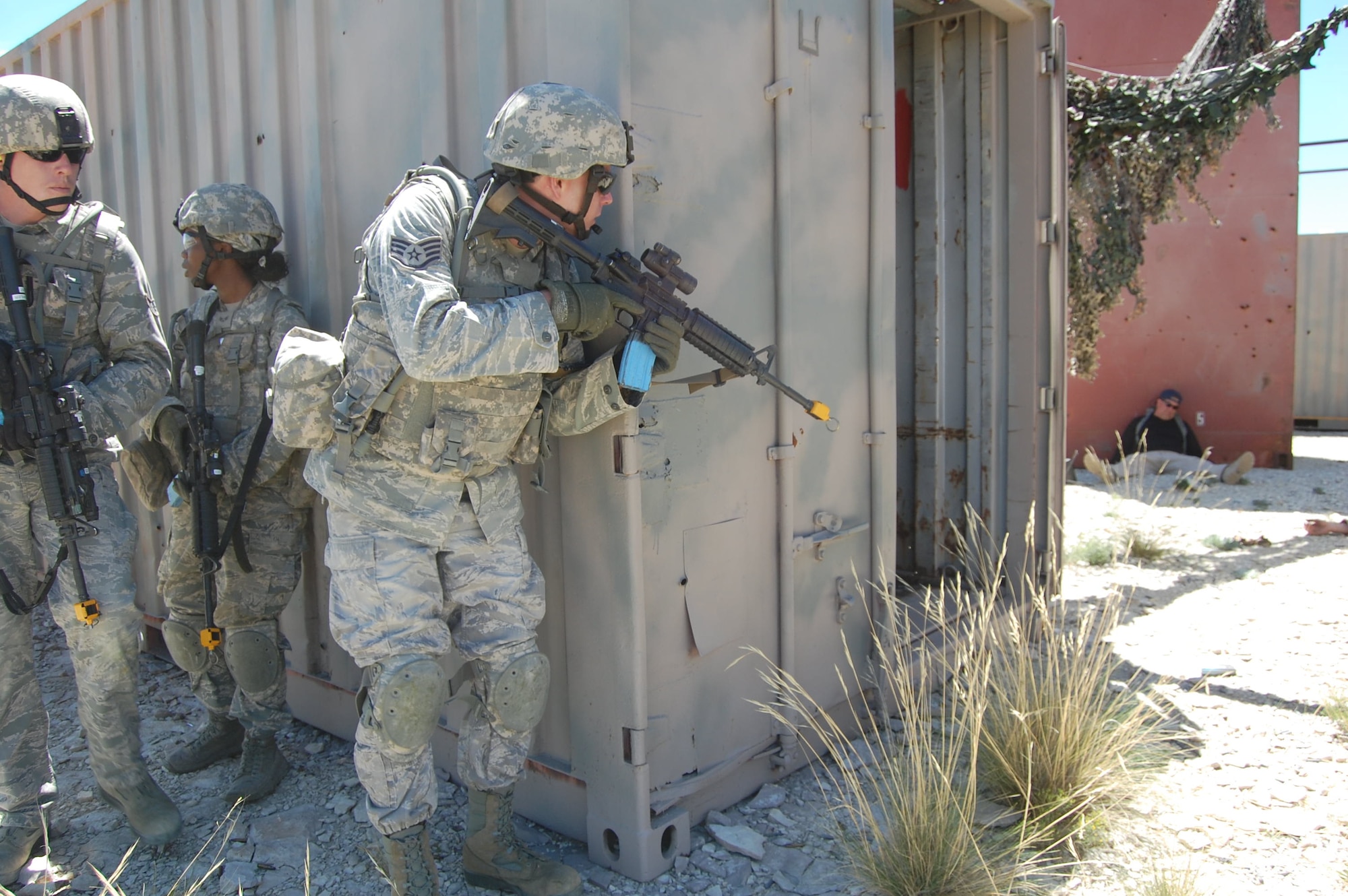 Members of the140th Explosive Ordnance Disposal Flight and the140th Security Forces Squadron, 140th Wing, Colorado Air National Guard, executed a multi-stage mission scenario, while simultaneously being evaluated by the Inspector General team to identify weaknesses and improve tactics August 6 at Airburst Range, Fort Carson, Colo. (US Air National Guard photo by Capt. Kinder Blacke)