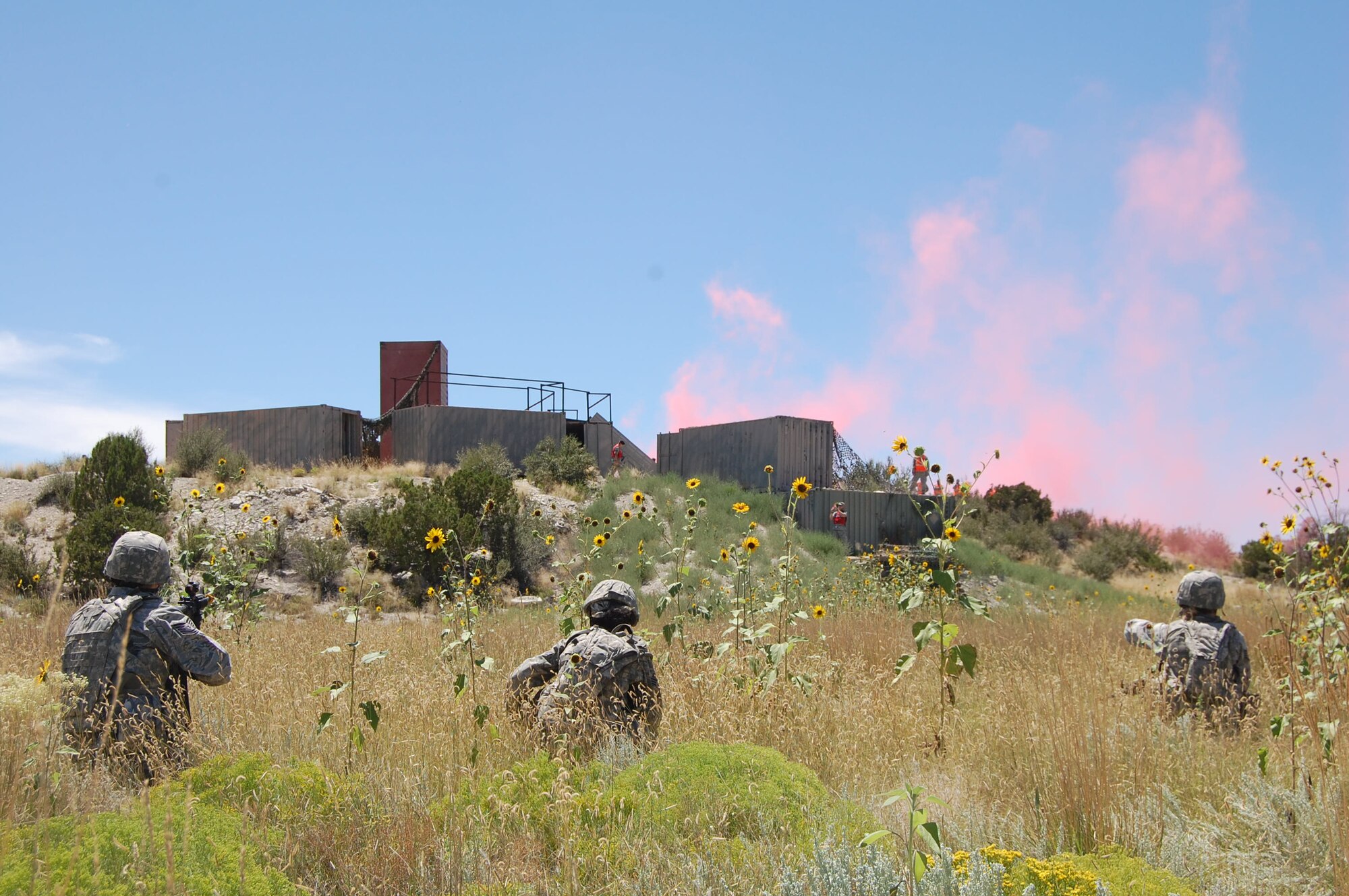 Members of the140th Explosive Ordnance Disposal Flight and the140th Security Forces Squadron, 140th Wing, Colorado Air National Guard, executed a multi-stage mission scenario, while simultaneously being evaluated by the Inspector General team to identify weaknesses and improve tactics August 6 at Airburst Range, Fort Carson, Colo. (US Air National Guard photo by Capt. Kinder Blacke)