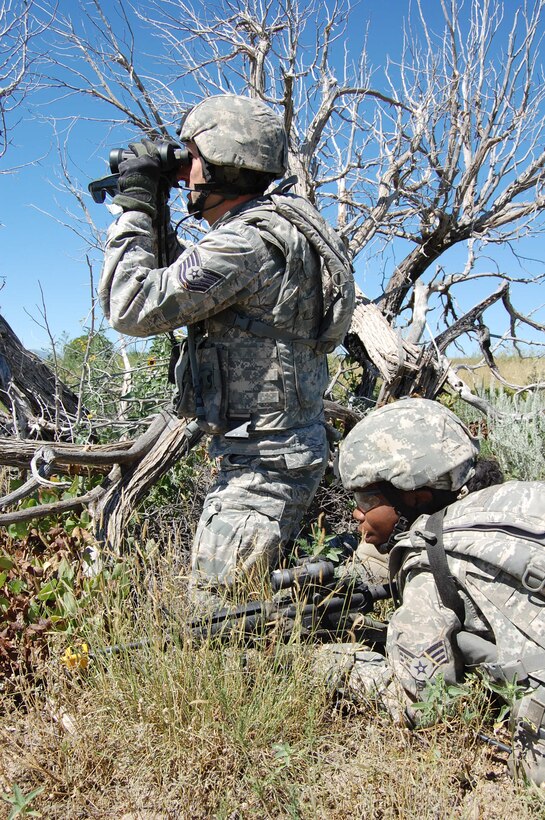 Members of the140th Explosive Ordnance Disposal Flight and the140th Security Forces Squadron, 140th Wing, Colorado Air National Guard, executed a multi-stage mission scenario, while simultaneously being evaluated by the Inspector General team to identify weaknesses and improve tactics August 6 at Airburst Range, Fort Carson, Colo. (US Air National Guard photo by Capt. Kinder Blacke)