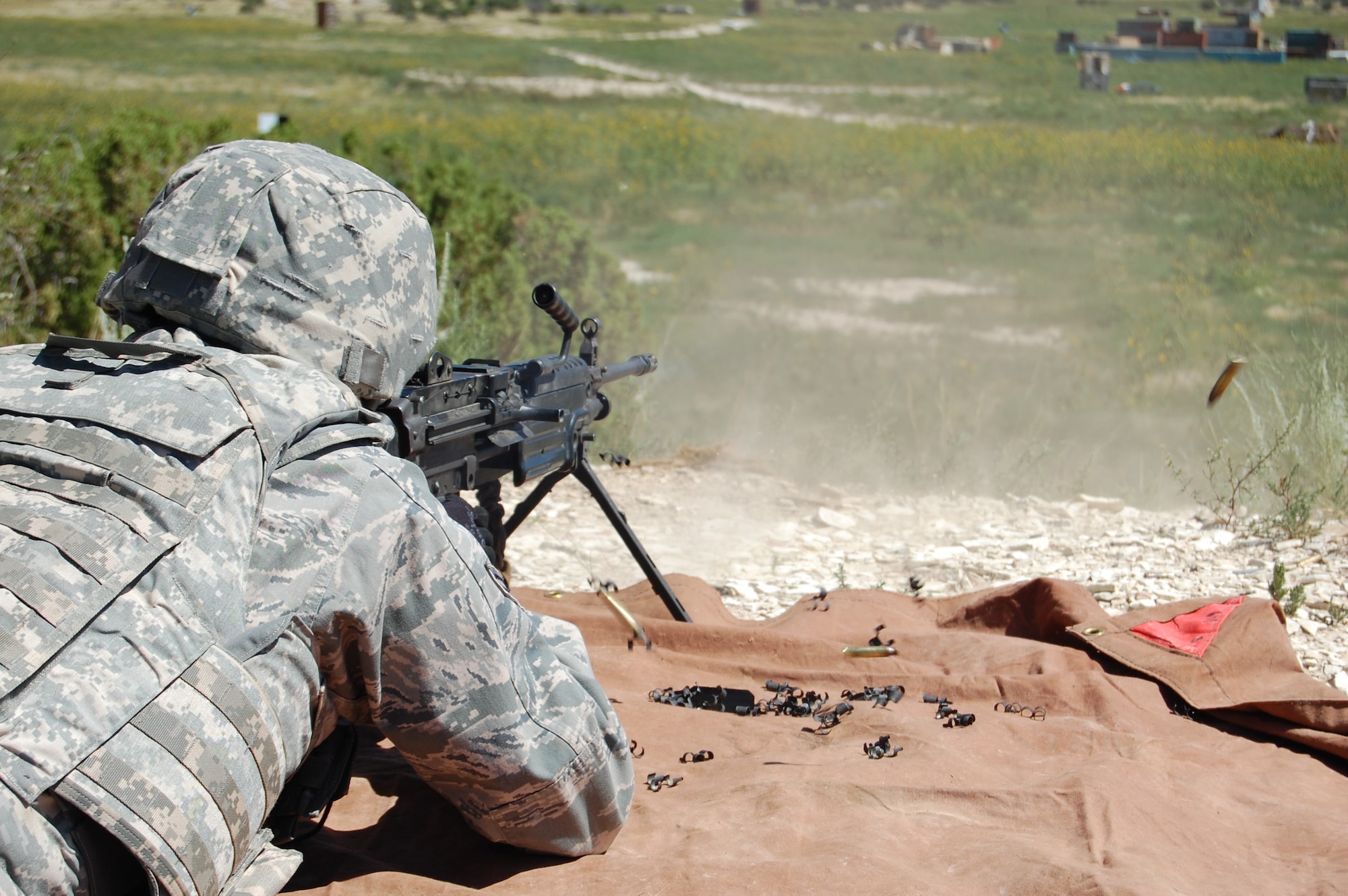 Members of the140th Explosive Ordnance Disposal Flight and the140th Security Forces Squadron, 140th Wing, Colorado Air National Guard, accomplished annual shooting qualifications during a joint training day August 4 at Airburst Range, Fort Carson, Colo. (US Air National Guard photo by Capt. Kinder Blacke)