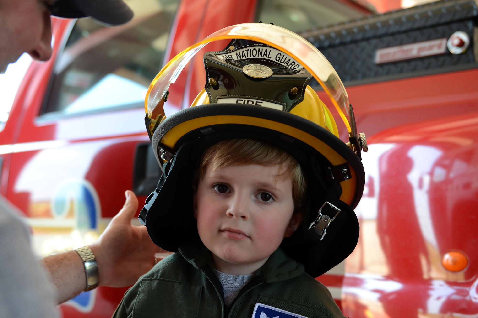 Declan Alexander visits McEntire Joint National Guard Base, Eastover, S.C., as the Swamp Fox “Pilot for a Day”, Aug. 15, 2015. Declan spent the day with U.S. Air Force 1st Lt. Cody "Rail" May, a fighter pilot with the 157th Fighter Squadron, and watched F-16 fighter jets land, toured aircrew flight equipment, sat in the cockpit of an F-16, and took a ride in a fire truck. The Pilot for a Day program is an opportunity for disadvantaged or seriously ill children to spend a day with members of the South Carolina Air National Guard. (S.C. Air National Guard photo by Airman 1st Class Ashleigh Pavelek/Released)
