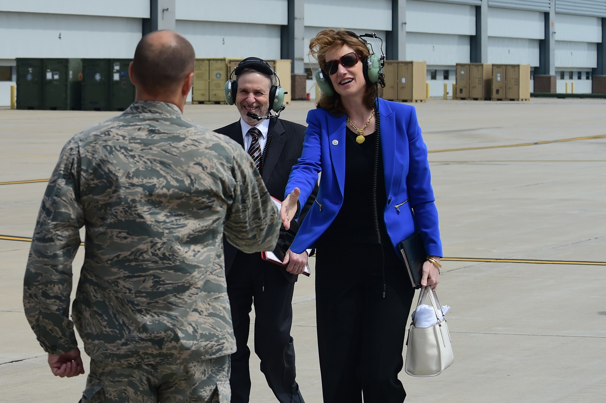 Lisa Disbrow, Acting Under Secretary of the Air Force, is greeted by Col. Scott Romberger, 460th Space Wing vice commander, Aug. 18, 2015, on Buckley Air Force Base, Colo. (U.S. Air Force photo by Airman 1st Class Luke W. Nowakowski/Released)
