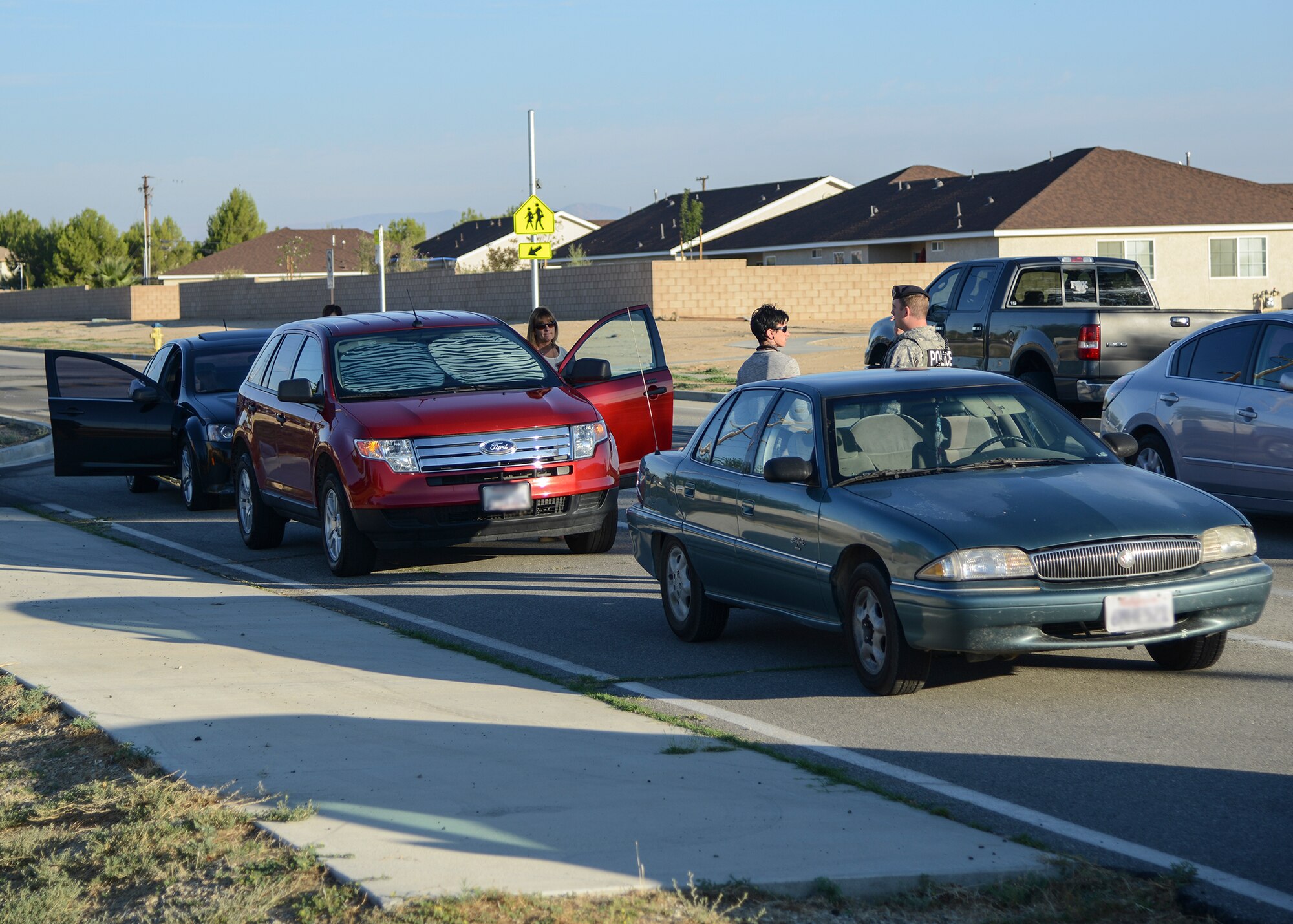 The 412th Security Forces Squadron patrolled the base schools on the first day of school, Aug. 17 in an effort to encourage safe practices and solve congestion problems during drop-off and pick-up hours. (U.S. Air Force photo by Rebecca Amber)