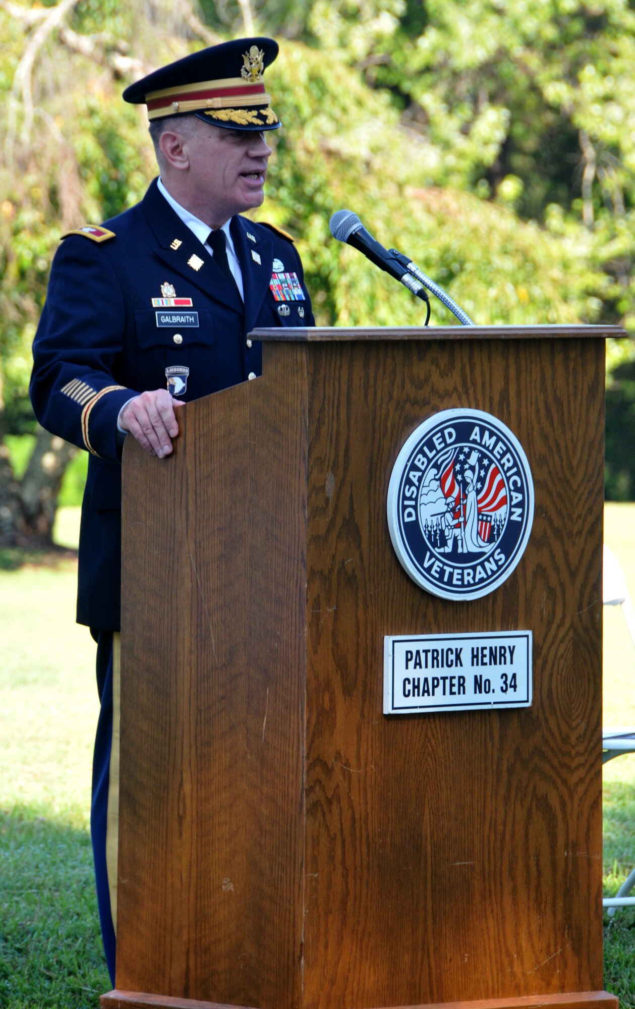 U.S. Army Col. William Galbraith, 733rd Mission Support Group commander, addresses approximately 100 World War II veterans and well-wishers during the "Spirit of '45 Day," ceremony at Williamsburg Memorial Park, Va., Aug 16, 2015. Galbraith told the audience that the country loses about 500 WWII veterans each day, so it is important to honor them.  (U.S. Army photo by Greg Mueller/Released)