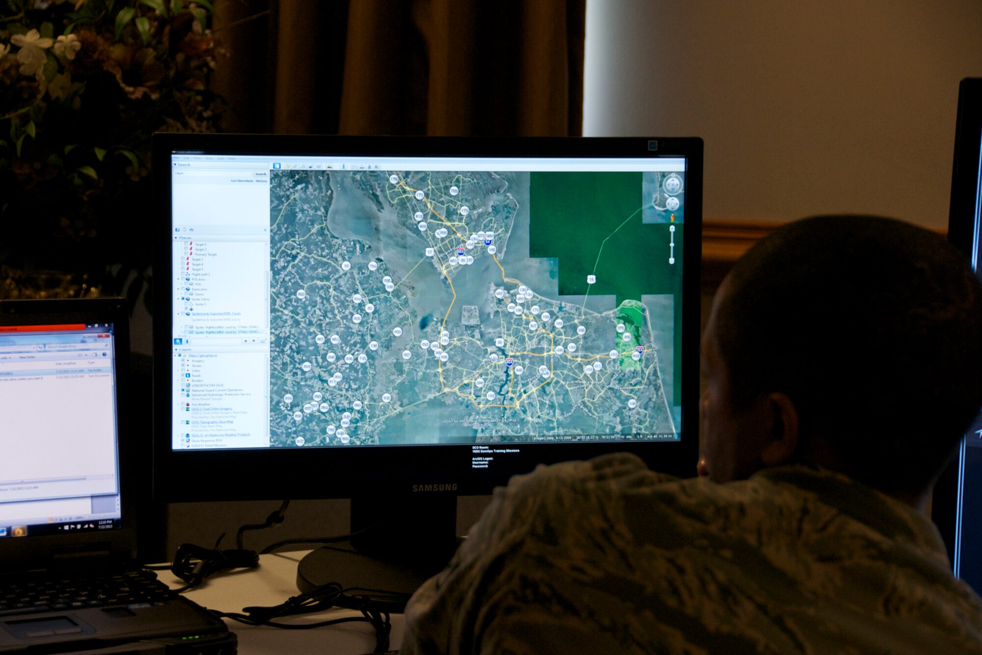 A 192d Intelligence Squadron member performs an Incident Awareness Assessment in the Virginia Beach area. Members’ of the 192d Intelligence Squadron, the Virginia Joint Forces Headquarters, Civil Air Patrol and local emergency response agencies participated in an Incident Awareness and Assessment (IAA) exercise at Camp Pendleton, Virginia Beach, Virginia, July 22, 2015. (U.S. Air National Guard photo by Master Sgt. Carlos J. Claudio/Released)