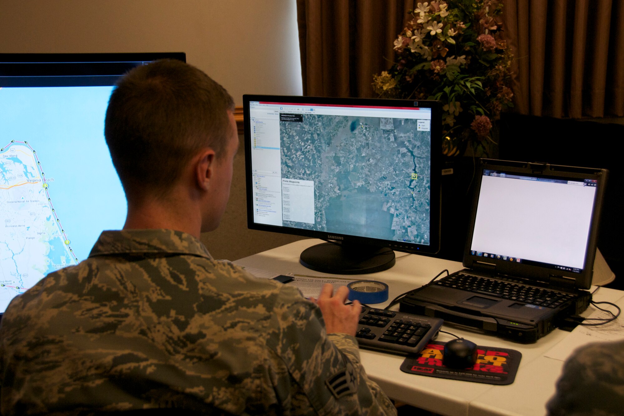 A 192d Intelligence Squadron member performs an Incident Awareness Assessment in the Virginia Beach area. Members’ of the 192d Intelligence Squadron, the Virginia Joint Forces Headquarters, Civil Air Patrol and local emergency response agencies participated in an Incident Awareness and Assessment (IAA) exercise at Camp Pendleton, Virginia Beach, Virginia, July 22, 2015. (U.S. Air National Guard photo by Master Sgt. Carlos J. Claudio/Released)