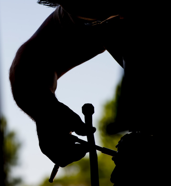 U.S. Air Force Staff Sgt. Keith Sharron, 23d Logistics Readiness Squadron vehicle and equipment maintenance craftsman, removes and replaces a water valve on a street sweeper vehicle Aug. 11, 2015, at Moody Air Force Base, Ga. The Vehicle Management Flight maintains an average 94.9 percent mission capable rate, 4.9 percent above the previous Air Combat Command standard of 90 percent. (U.S. Air Force photo by Airman 1st Class Greg Nash/Released) 