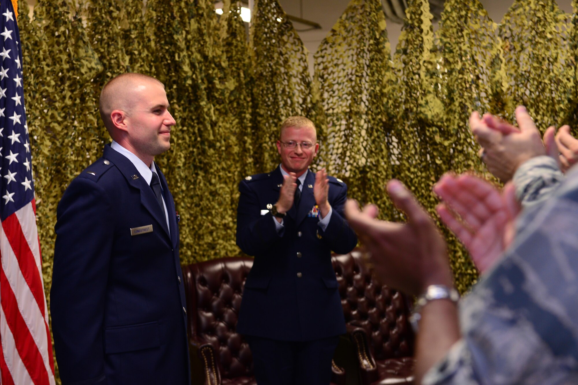 Staff Sgt. Brandon Longstreet, 2nd Medical Group public health technician, is commissioned as a first lieutenant for the Medical Service Corps during a commissioning ceremony held at Barksdale Air Force Base, La., Aug. 14, 2015. Longstreet went through a rigorous application process, wrote several essays and conducted several interviews before being selected for the MSC. (U.S. Air Force Photo/Airman 1st Class Luke Hill)