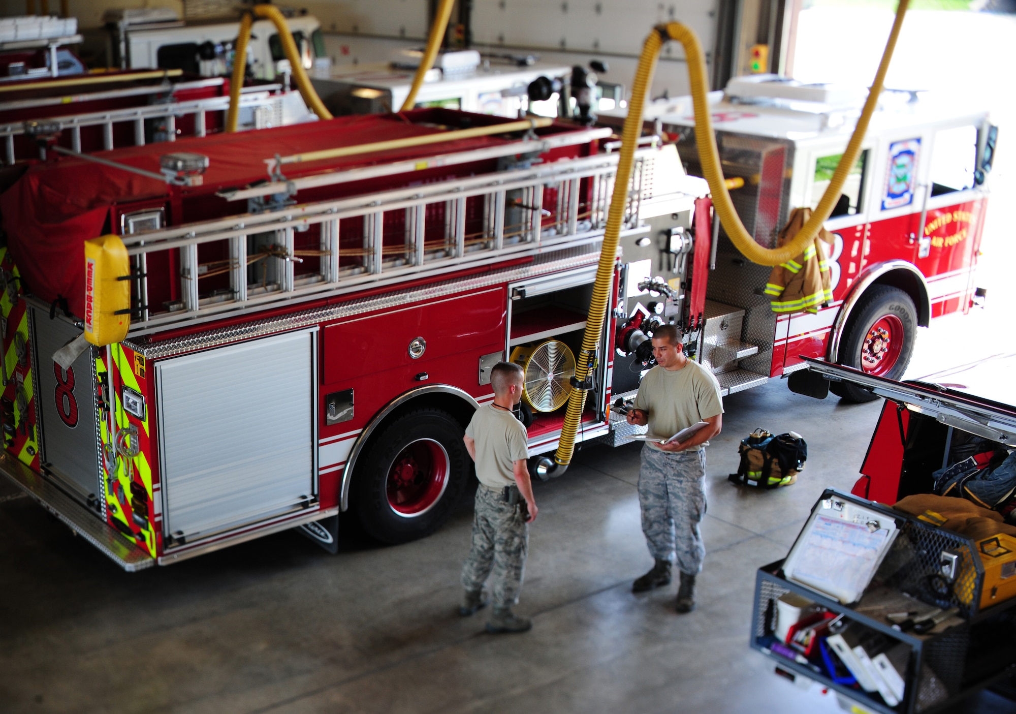 Staff Sgt. Nathan Silk, 509th Civil Engineer Squadron firefighter, right, and Staff Sgt. Jason Lopez, 509th CES firefighter inventory equipment at Whiteman Air Force Base, Mo., May 28, 2015. Inventorying is important to ensure equipment is accounted for in order to perform daily duties. (U.S. Air Force photo by Senior Airman Keenan Berry/Released)